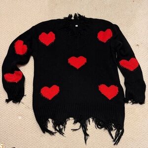 Chic Black V-Neck Sweater with Red Heart Accents